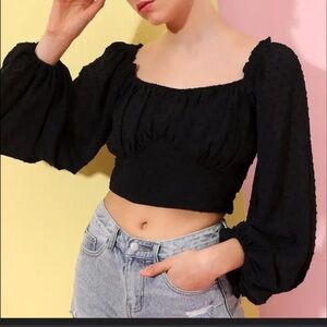 Black long sleeve top with polka dots and ruffle details NEVER WORN